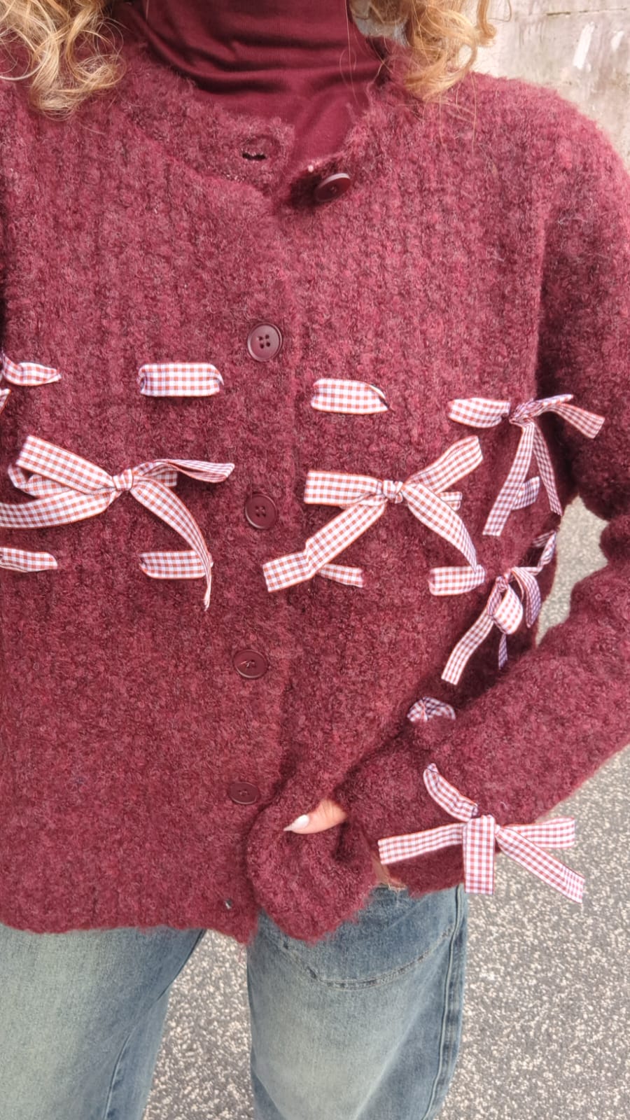 Cardigan teddy con fiocchi