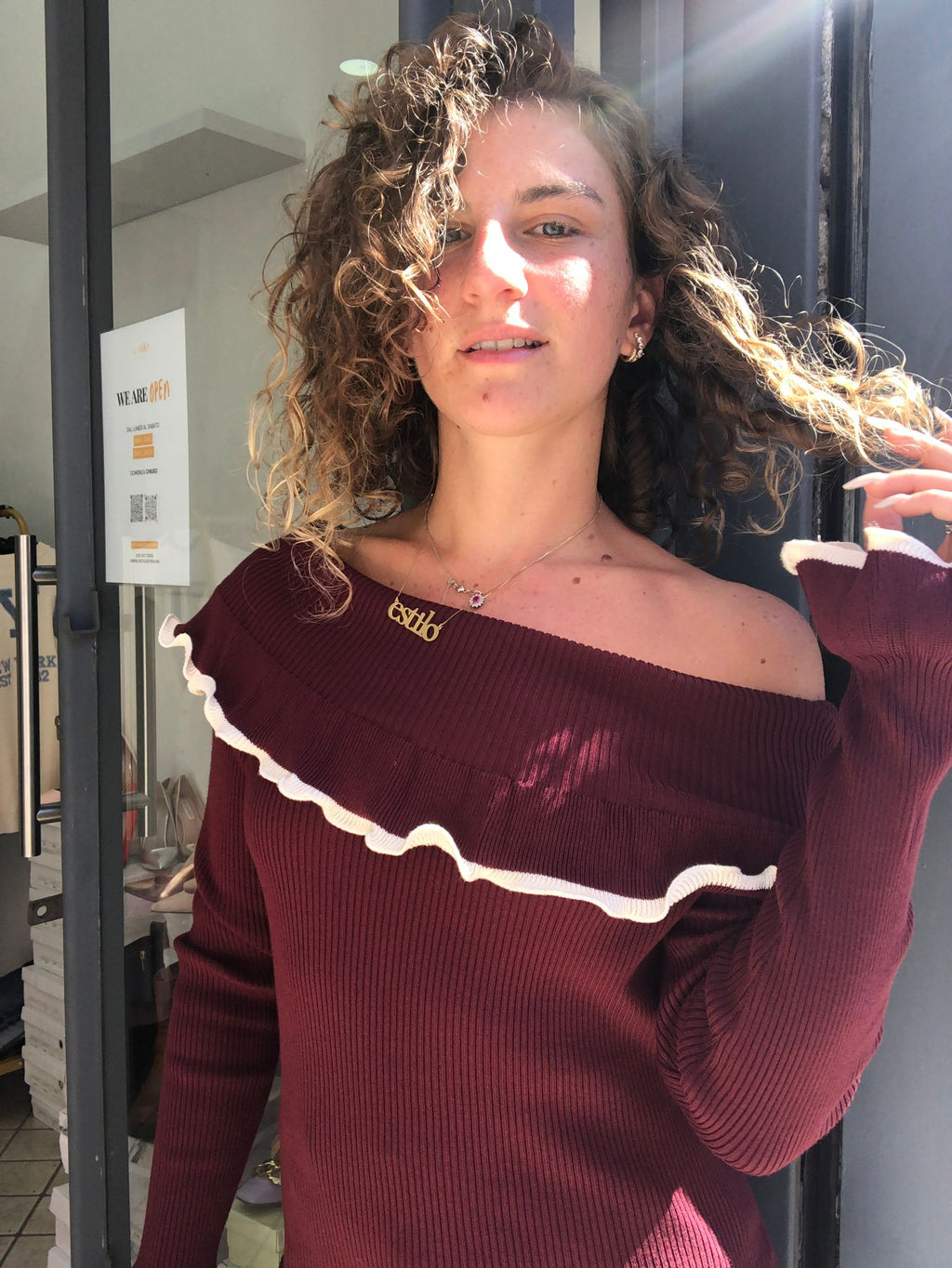 Maglione con scollo a barca